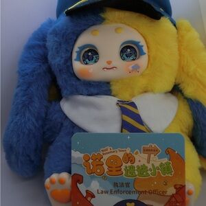 Blue and Yellow Plush Toy with Hat